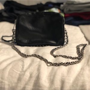 Cross-body chain strap bag with spike detailing